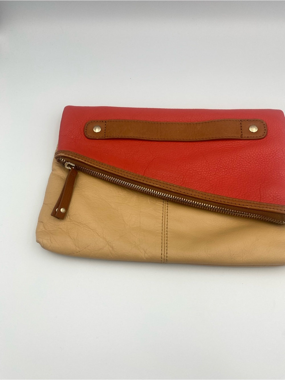 levity Two-Tone Foldover Clutch in Red & Tan